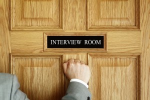 Businessman knocking on interview room door concept for recruitment or medical checkup with a consultant
